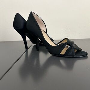 Women’s Nine West size 6 1/2 black satin pump. 3 1/2” heel.